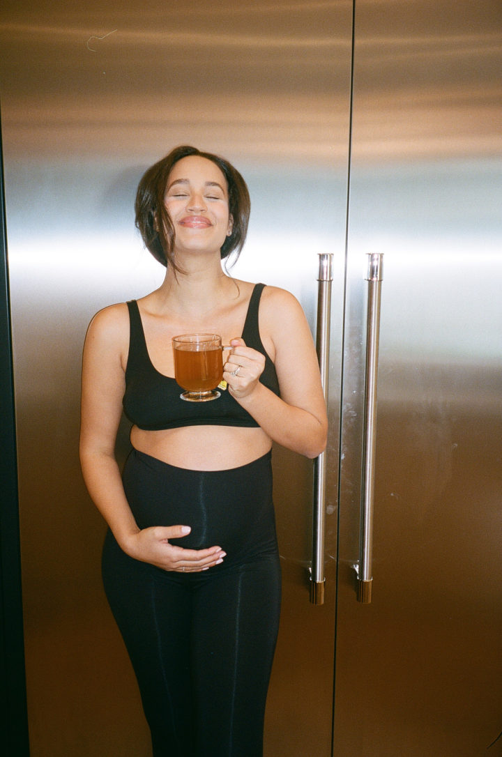 pregnant woman holding a drink