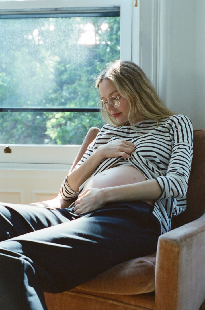 pregnant woman in chair