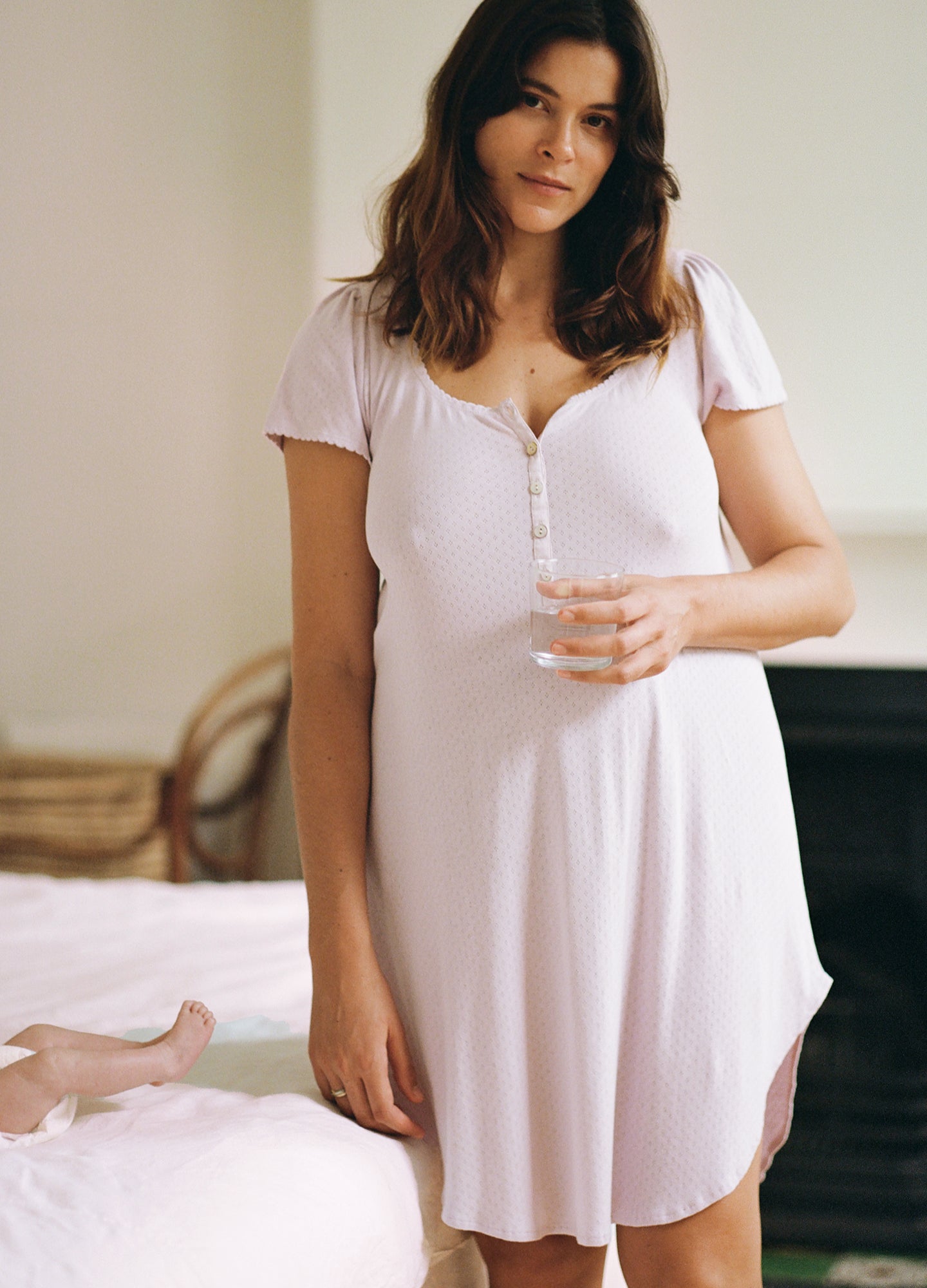 Pregnant woman wearing maternity pajamas