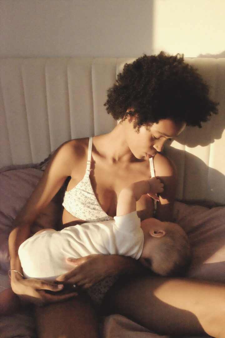woman nursing baby