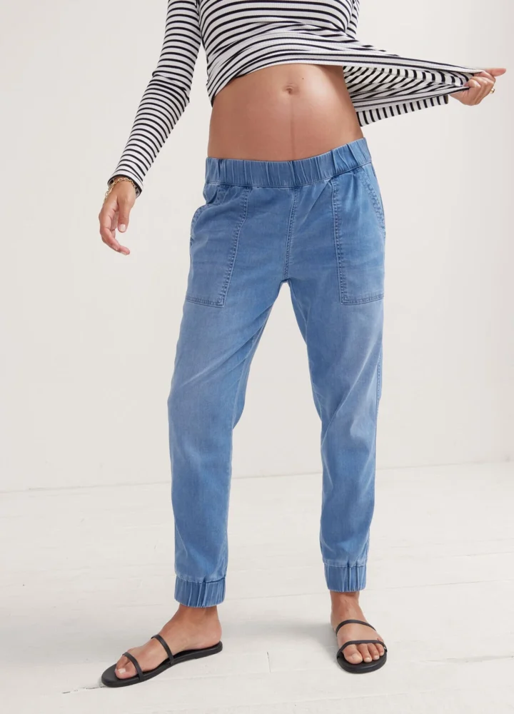 Pregnant woman wearing The Easy Denim Jogger
